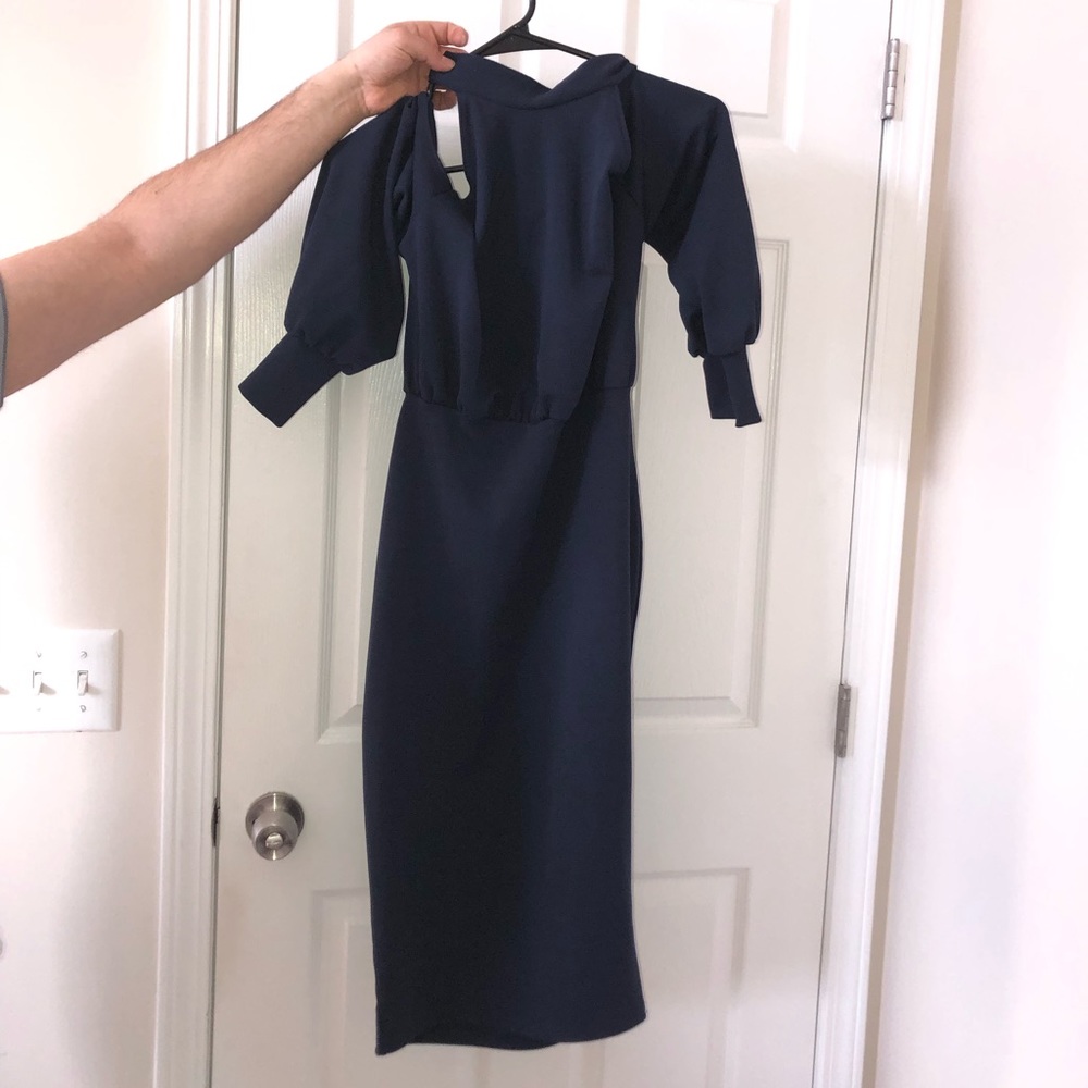 Navy blue dress with sleeves but open on the shoulders